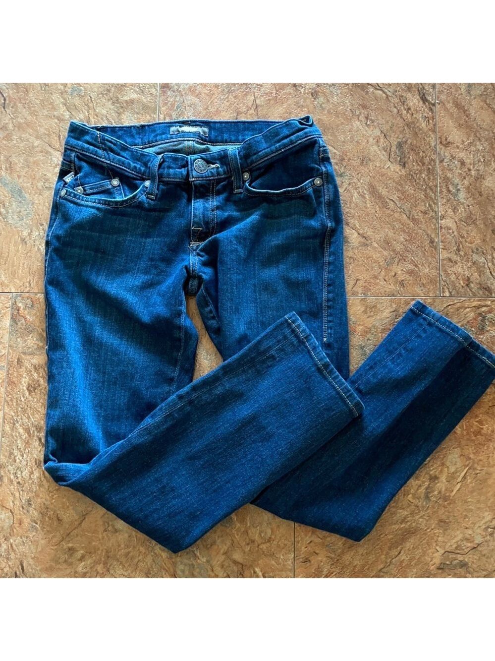 Rock & Republic jeans size 27 Inseam is 28 inches.